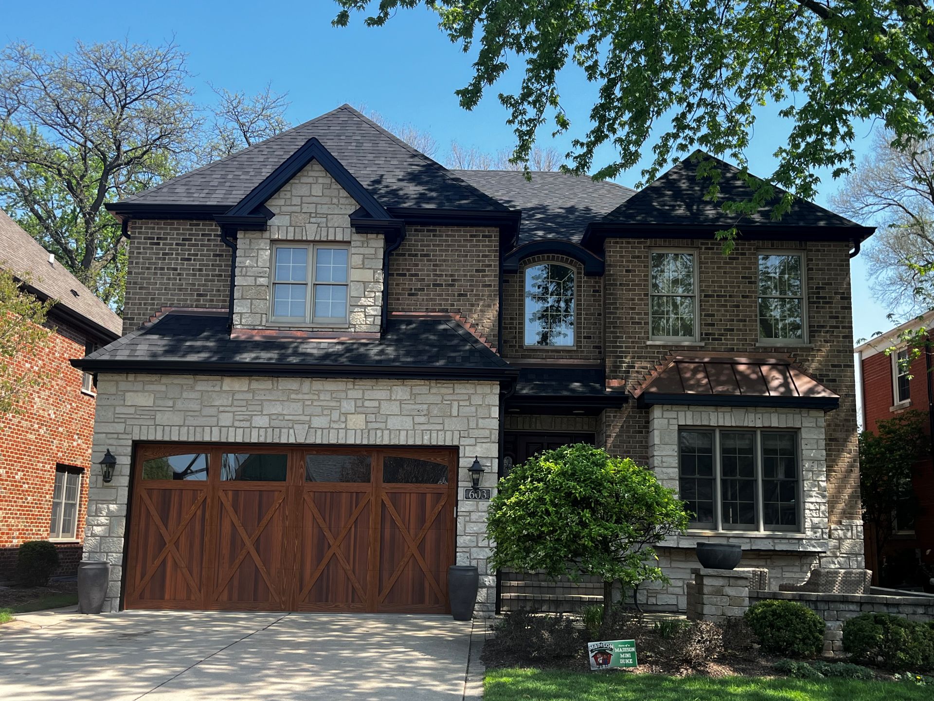 Complete Exterior Upgrade in Elmhurst, IL: New Roof, Gutters and Garage Door Transformation